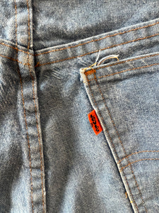 Orange Tab Button Fly Levis $118